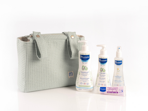 Bolsa de carrito en color menta con los 4 de los productos más vendidos de Mustela. - Mustela España - 1