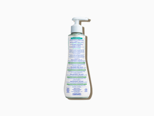 El bote de la crema Stelatopia +, crema relipidizante antipicor para pieles atopicas, explica su formulación, su modo de acción y sus condiciones de uso. - Mustela España - 2