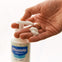 El aplicador de la loción corporal hidratante Mustela dosifica la cantidad justa en tu mano