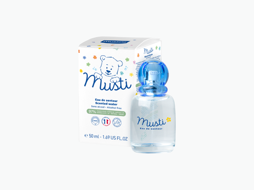Caja del agua perfumada de Mustela y a su derecha el bote de cristal. - Mustela España - 3
