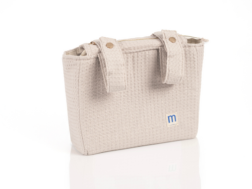 Bolsa de carrito de Mustela en tono beige con dos cintas que se sujetan al cochecito y se abrochan con botón de click. - Mustela España - 6