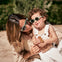 Gafas de sol verde para adulto y bebé Mustela.slider