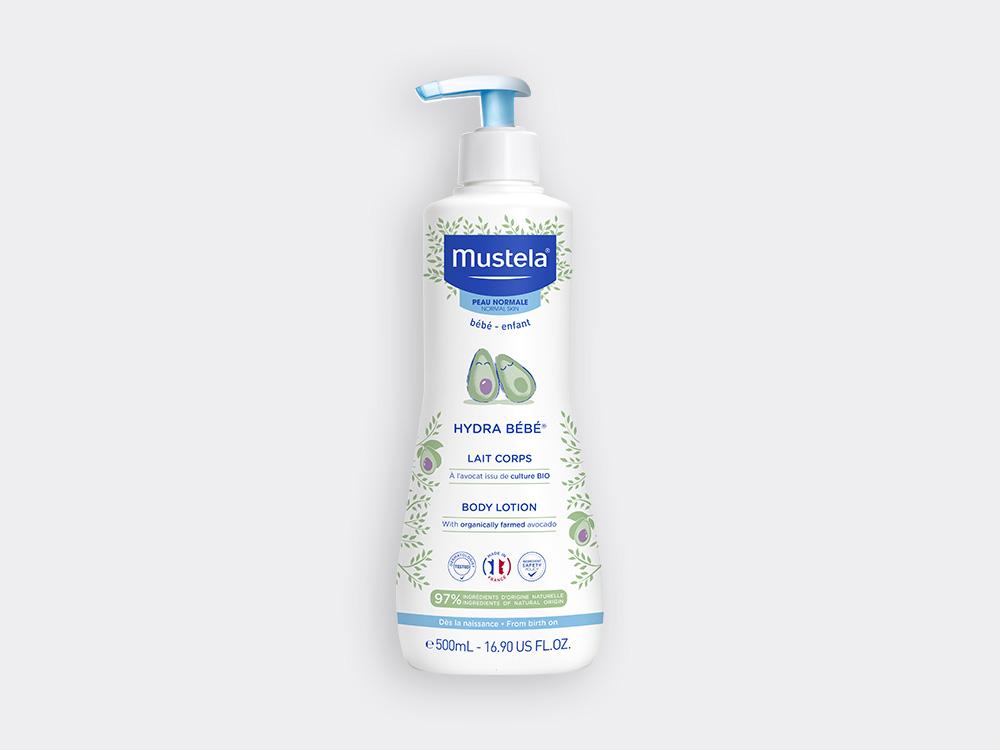 Bote de la leche hidratante para bebés de Mustela, con dosificador y de color blanco